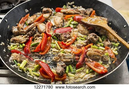 Delicious Paella, traditional and famous Spanish dish; Xiamen, Fujian province, China View Large Photo Image Stock Image - Delicious Paella, traditional and famous Spanish dish; Xiamen, Fujian province, China. Fotosearch