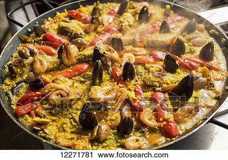 Stock Image - Delicious Paella, traditional and famous Spanish dish; Xiamen, Fujian province, China. Fotosearch