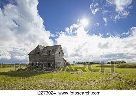 Picture - Dilapidated house on the prairies; Winnipeg, Manitoba, Canada. Fotosearch