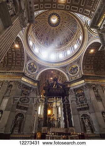 Stock Image - Dome inside St. Peter's Basilica in Vatican city, the autonomous capitol of the Roman Catholic Church; Rome, Italy. Fotosearch
