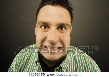 Expressive portrait of a man; Edmonton, Alberta, Canada View Large Photo Image Stock Photography - Expressive portrait of a man; Edmonton, Alberta, Canada. Fotosearch