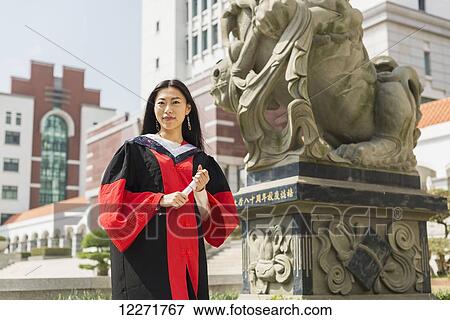 Female student at University graduation; Xiamen, Fujian, China View Large Photo Image Stock Photo - Female student at University graduation; Xiamen, Fujian, China. Fotosearch