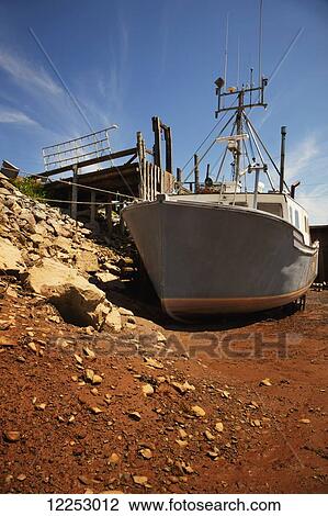 Fishing boat in the Bay of Fundy; New Brunswick, Canada View Large Photo Image Stock Image - Fishing boat in the Bay of Fundy; New Brunswick, Canada. Fotosearch