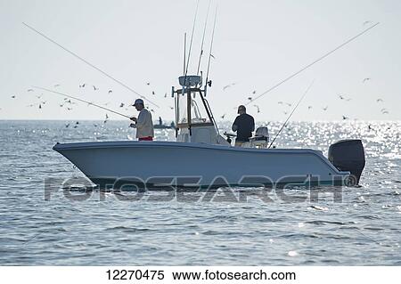 Stock Photography - Fishing for stripers off the Atlantic coast; Massachusetts, United States of America. Fotosearch
