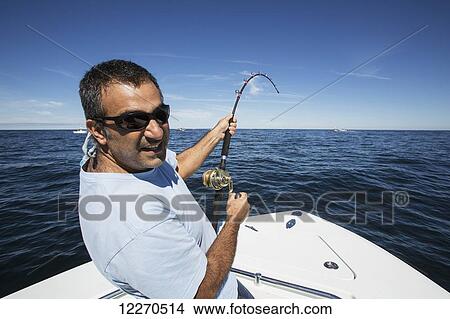 Picture - Fishing for tuna off the Atlantic coast; Massachusetts, United States of America. Fotosearch