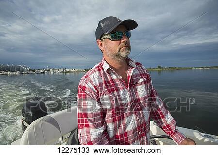 Fishing in the Boston harbour; Boston, Massachusetts, United States of America View Large Photo Image Stock Image - Fishing in the Boston harbour; Boston, Massachusetts, United States of America. Fotosearch
