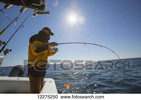 Fishing off a boat; Montauk, New York, United States of America View Large Photo Image Stock Image - Fishing off a boat; Montauk, New York, United States of America. Fotosearch