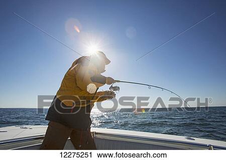 Fishing off a boat; Montauk, New York, United States of America View Large Photo Image Stock Image - Fishing off a boat; Montauk, New York, United States of America. Fotosearch