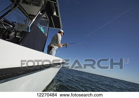 Fishing off the Atlantic coast; Massachusetts, United States of America View Large Photo Image Picture - Fishing off the Atlantic coast; Massachusetts, United States of America. Fotosearch