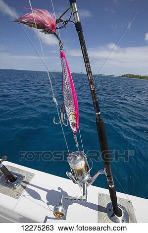 Fishing rod with lure on a boat; Tahiti View Large Photo Image Stock Image - Fishing rod with lure on a boat; Tahiti. Fotosearch