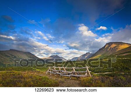 Stock Image - Flattop and Chugach Mountains in evening light, Chugach State Park; Alaska, United States of America. Fotosearch