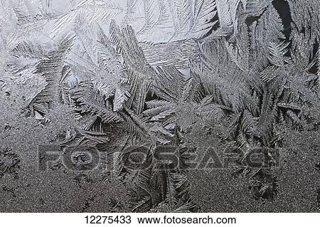 Stock Image - Frost on window; Waterloo, Quebec, Canada. Fotosearch