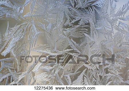 Stock Photograph - Frost on window; Waterloo, Quebec, Canada. Fotosearch