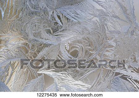 Stock Photography - Frost on window; Waterloo, Quebec, Canada. Fotosearch