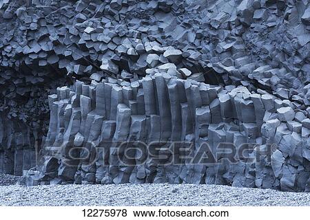 Hexagonal basalt columns rise out of the earth near the beaches of Vik; Iceland View Large Photo Image Stock Photo - Hexagonal basalt columns rise out of the earth near the beaches of Vik; Iceland. Fotosearch