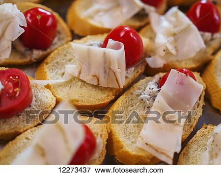 Stock Photo - Hors d'oeuvres prepared by a Tuscan chef; Capanuccia, Florence, Italy. Fotosearch
