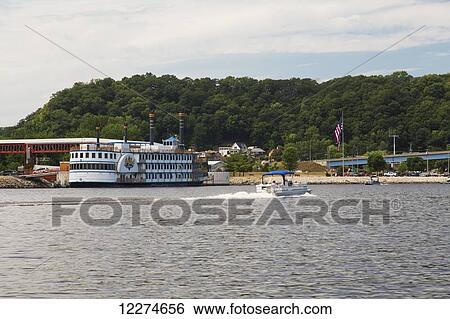 Stock Photograph - Lady Luck Casino and boaters on the Mississippi River; Marquette, Iowa, United States of America. Fotosearch