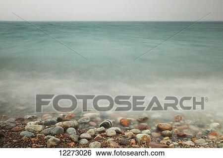 Lake Superior and rocky shoreline, near Thunder Bay; Ontario, Canada View Large Photo Image Stock Photograph - Lake Superior and rocky shoreline, near Thunder Bay; Ontario, Canada. Fotosearch