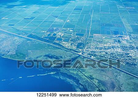 Stock Photo - Land seen from an airplane; United States of America. Fotosearch