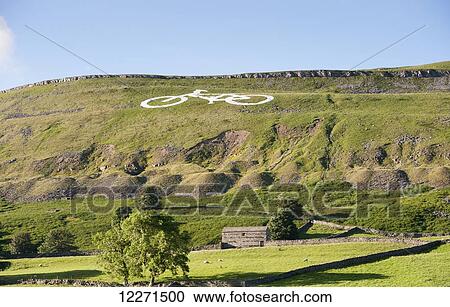Large bicycle marked out on Staggs Fell, behind Hawes, to welcome the Tour de France, which passed through in 2014; Yorkshire, England View Large Photo Image Stock Image - Large bicycle marked out on Staggs Fell, behind Hawes, to welcome the Tour de France, which passed through in 2014; Yorkshire, England. Fotosearch