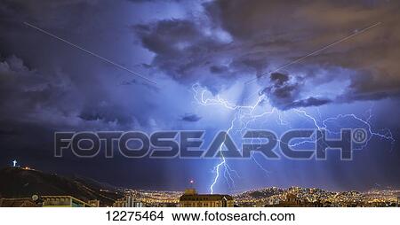 Lightning lights up the night skies above the city of Cochabamba; Cochabamba, Bolivia View Large Photo Image Picture - Lightning lights up the night skies above the city of Cochabamba; Cochabamba, Bolivia. Fotosearch