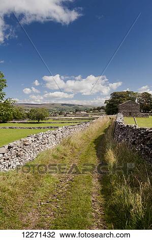 Looking down Shaws Lane towards Burtersett, near Hawes; Wensleydale, Yorkshire, England View Large Photo Image Stock Image - Looking down Shaws Lane towards Burtersett, near Hawes; Wensleydale, Yorkshire, England. Fotosearch