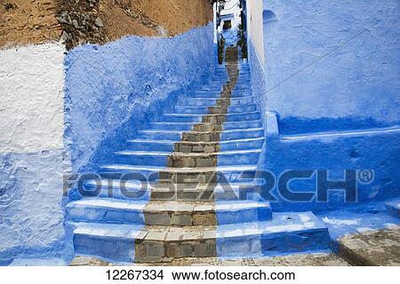 Picture - Looking up a stairway in the medina; Chefchaouen, Morocco. Fotosearch
