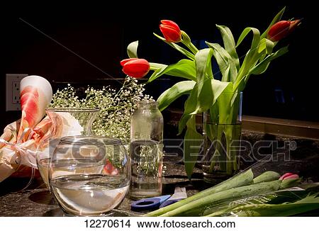 Picture - Making flower arrangements with fresh flowers; Yarrow, British Columbia, Canada. Fotosearch