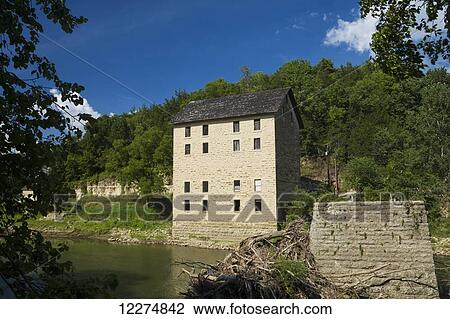 Stock Image - Motor Mill Historic site along the Turkey River, near Elkader; Iowa, United States of America. Fotosearch