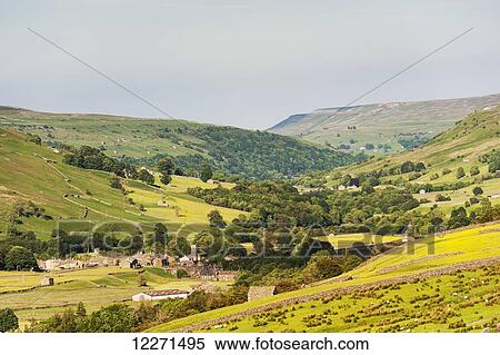 Muker village, with Swaledale valley behind, Yorkshire Dales National Park; North Yorkshire, England View Large Photo Image Stock Photography - Muker village, with Swaledale valley behind, Yorkshire Dales National Park; North Yorkshire, England. Fotosearch
