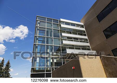 New construction of office building with glass stairway feature; Edmonton, Alberta, Canada View Large Photo Image Stock Photo - New construction of office building with glass stairway feature; Edmonton, Alberta, Canada. Fotosearch