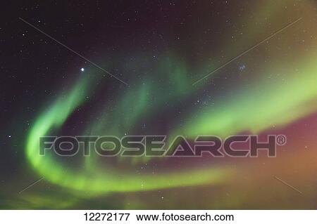 Stock Photo - Northern Lights dance in clear skies above Barrow, Arctic Alaska; Alaska, United States of America. Fotosearch