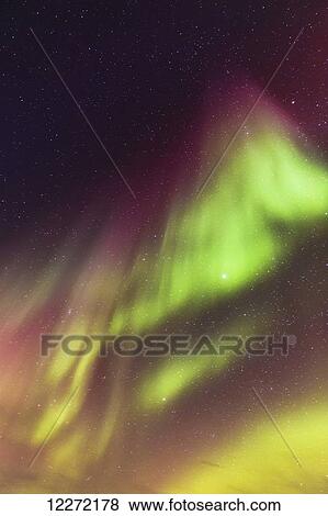 Northern Lights dance in clear skies above Barrow, Arctic Alaska; Alaska, United States of America View Large Photo Image Stock Photo - Northern Lights dance in clear skies above Barrow, Arctic Alaska; Alaska, United States of America. Fotosearch