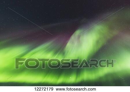 Northern Lights dance in clear skies above Barrow, Arctic Alaska; Alaska, United States of America View Large Photo Image Stock Photo - Northern Lights dance in clear skies above Barrow, Arctic Alaska; Alaska, United States of America. Fotosearch