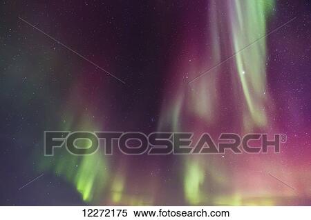 Stock Photography - Northern Lights dance in clear skies above Barrow, Arctic Alaska; Alaska, United States of America. Fotosearch