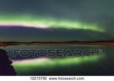 Northern lights reflected over the Noatak River on a clear night; Noatak, Alaska, United States of America View Large Photo Image Stock Image - Northern lights reflected over the Noatak River on a clear night; Noatak, Alaska, United States of America. Fotosearch