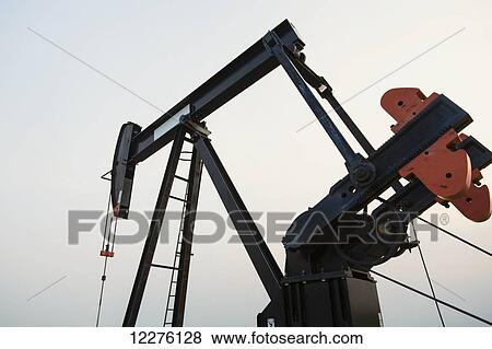 Oil pumpjack at work in rural Alberta; St. Albert, Alberta, Canada View Large Photo Image Stock Photo - Oil pumpjack at work in rural Alberta; St. Albert, Alberta, Canada. Fotosearch