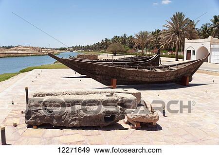 Old boats and anchor stones, Al Baleed Archaeological Park; Salalah, Dhofar, Oman View Large Photo Image Stock Photo - Old boats and anchor stones, Al Baleed Archaeological Park; Salalah, Dhofar, Oman. Fotosearch