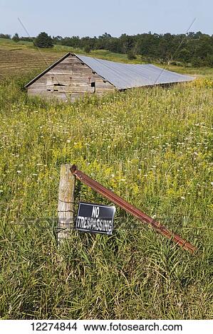 Old hog house and no Trespassing sign, near Edgewood; Iowa, United States of America View Large Photo Image Picture - Old hog house and no Trespassing sign, near Edgewood; Iowa, United States of America. Fotosearch
