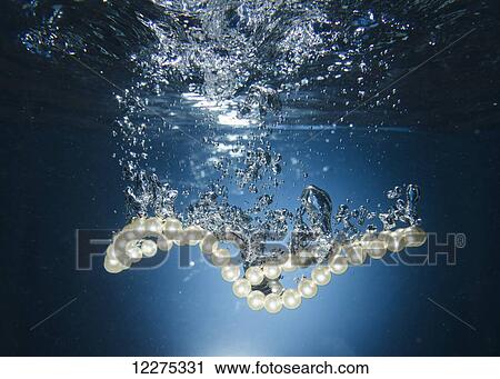 Pearl necklace underwater; Tarifa, Cadiz, Andalusia, Spain View Large Photo Image Stock Image - Pearl necklace underwater; Tarifa, Cadiz, Andalusia, Spain. Fotosearch