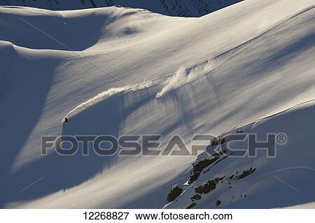 People extreme snowboarding in mountains of New Zealand View Large Photo Image Stock Photo - People extreme snowboarding in mountains of New Zealand. Fotosearch