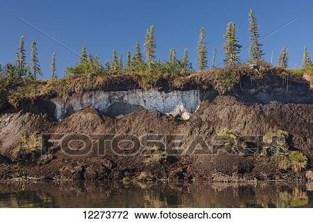 Stock Image - Permafrost melting and eroding the banks of the Noatak River; Noatak, Alaska, United States of America. Fotosearch