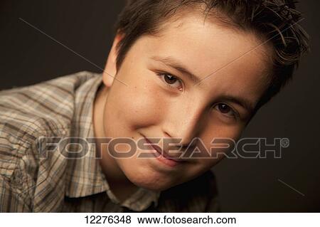 Stock Photo - Portrait of a boy; Edmonton, Alberta, Canada. Fotosearch