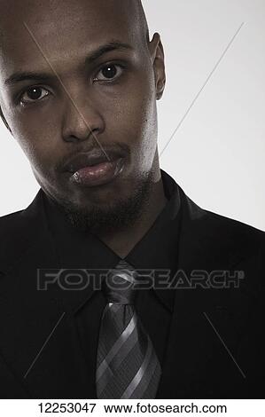 Portrait of a businessman; Edmonton, Alberta, Canada View Large Photo Image Stock Photo - Portrait of a businessman; Edmonton, Alberta, Canada. Fotosearch