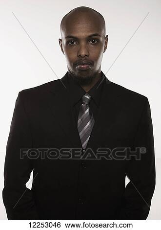 Stock Photograph - Portrait of a businessman; Edmonton, Alberta, Canada. Fotosearch