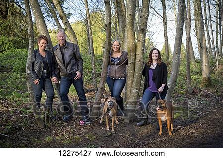Portrait of a family with two daughters and two dogs; British Columbia, Canada View Large Photo Image Stock Photo - Portrait of a family with two daughters and two dogs; British Columbia, Canada. Fotosearch