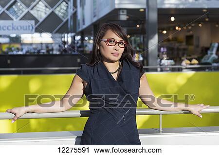 Portrait of a professional businesswoman in a shopping centre; St. Albert, Alberta, Canada View Large Photo Image Stock Image - Portrait of a professional businesswoman in a shopping centre; St. Albert, Alberta, Canada. Fotosearch