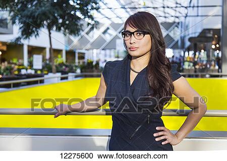 Portrait of a professional businesswoman in a shopping centre; St. Albert, Alberta, Canada View Large Photo Image Stock Image - Portrait of a professional businesswoman in a shopping centre; St. Albert, Alberta, Canada. Fotosearch