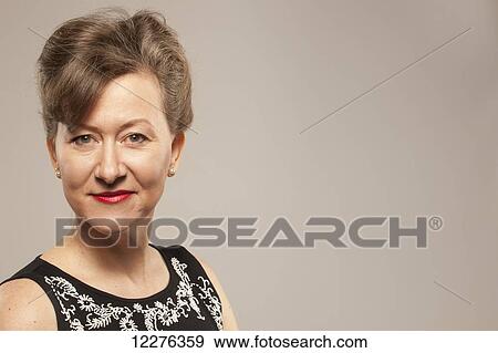 Portrait of a woman; Edmonton, Alberta, Canada View Large Photo Image Stock Photo - Portrait of a woman; Edmonton, Alberta, Canada. Fotosearch