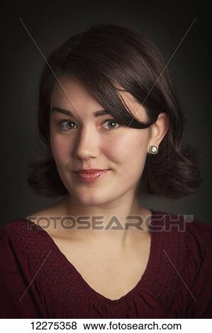 Stock Photo - Portrait of a young woman; United States of America. Fotosearch